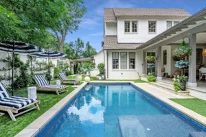 Stunning backyard and pool with pool care in Houston TX provided by Memorial Pool Services 
